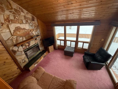 34 Ella Mae Crescent, Whispering Hills, AB - Indoor Photo Showing Living Room With Fireplace