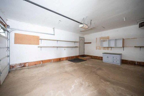 87, 231054 Township Road 623A, Rural Athabasca County, AB - Indoor Photo Showing Garage