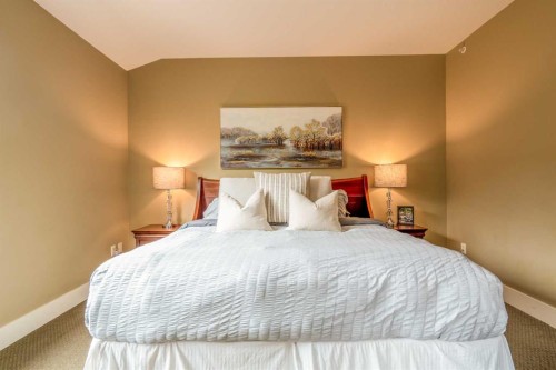 406-187 Kananaskis Way, Canmore, AB - Indoor Photo Showing Bedroom