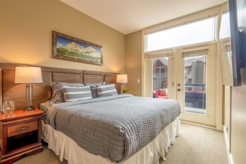 406-187 Kananaskis Way, Canmore, AB - Indoor Photo Showing Bedroom