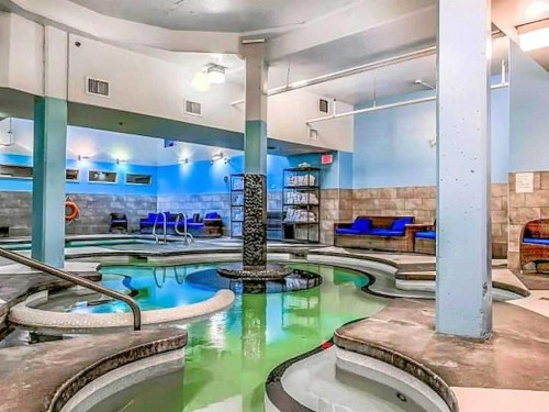 406-187 Kananaskis Way, Canmore, AB - Indoor Photo Showing Other Room With In Ground Pool