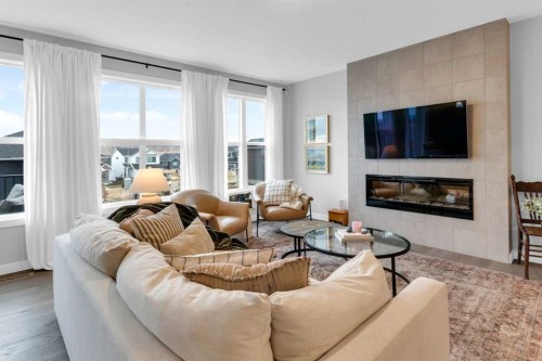 287 Rivercrest Boulevard, Cochrane, AB - Indoor Photo Showing Living Room With Fireplace