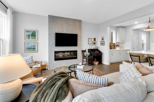 287 Rivercrest Boulevard, Cochrane, AB - Indoor Photo Showing Living Room With Fireplace