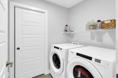 287 Rivercrest Boulevard, Cochrane, AB - Indoor Photo Showing Laundry Room