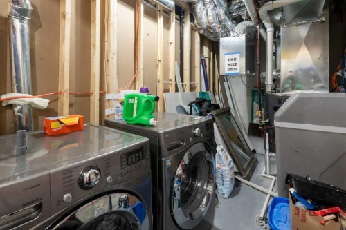 287 Rivercrest Boulevard, Cochrane, AB - Indoor Photo Showing Laundry Room