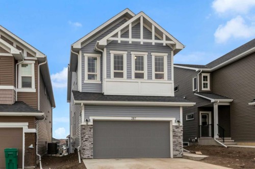 287 Rivercrest Boulevard, Cochrane, AB - Outdoor With Facade