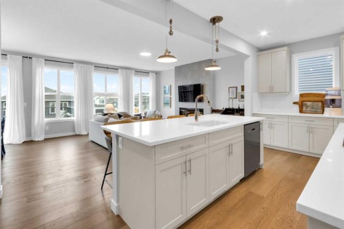 287 Rivercrest Boulevard, Cochrane, AB - Indoor Photo Showing Kitchen With Upgraded Kitchen