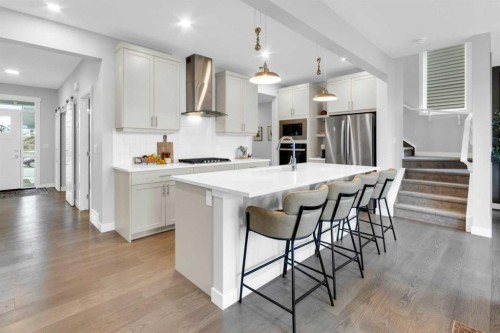 287 Rivercrest Boulevard, Cochrane, AB - Indoor Photo Showing Kitchen With Upgraded Kitchen