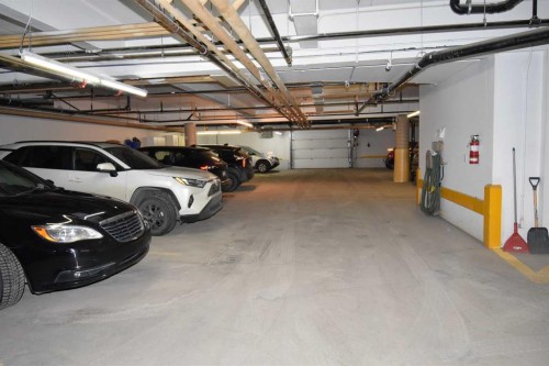 202-777 48 Street, Edson, AB - Indoor Photo Showing Garage