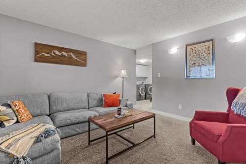 2-630 3Rd Street, Canmore, AB - Indoor Photo Showing Living Room