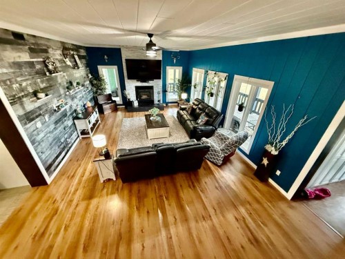 24403 East River Road, Hinton, AB - Indoor Photo Showing Other Room With Fireplace