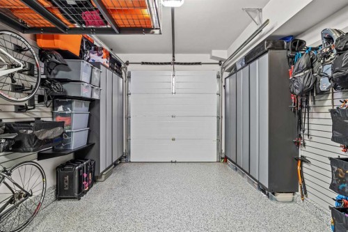 7 Creekside Mews, Canmore, AB - Indoor Photo Showing Garage