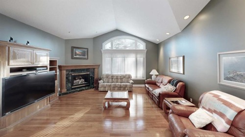 30 Ravine Drive, Whitecourt, AB - Indoor Photo Showing Living Room With Fireplace