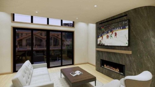 713B 4Th Street, Canmore, AB - Indoor Photo Showing Living Room With Fireplace