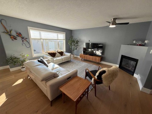 140 Mackay Crescent, Hinton, AB - Indoor Photo Showing Living Room With Fireplace