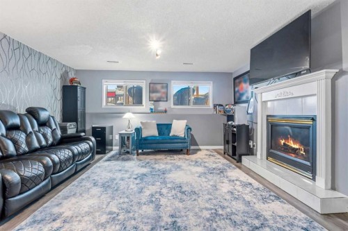 3849 55 Avenue, Whitecourt, AB - Indoor Photo Showing Living Room With Fireplace