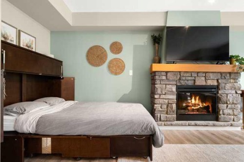 2206-250 2 Avenue, Dead Man'S Flats, AB - Indoor With Fireplace