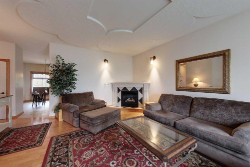 732 9 Street Sw, Slave Lake, AB - Indoor Photo Showing Living Room With Fireplace