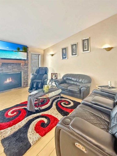 3 Powers Cove, Whitecourt, AB - Indoor Photo Showing Living Room With Fireplace