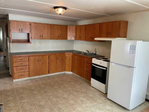 4611 45 Street, Mayerthorpe, AB - Indoor Photo Showing Kitchen With Double Sink