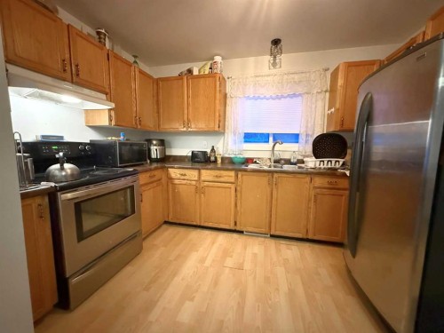 4909 42 Street, Athabasca, AB - Indoor Photo Showing Kitchen With Double Sink