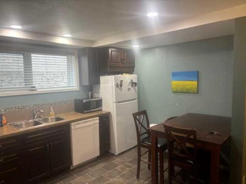 13 Aspen Crescent, Jasper, AB - Indoor Photo Showing Kitchen With Double Sink