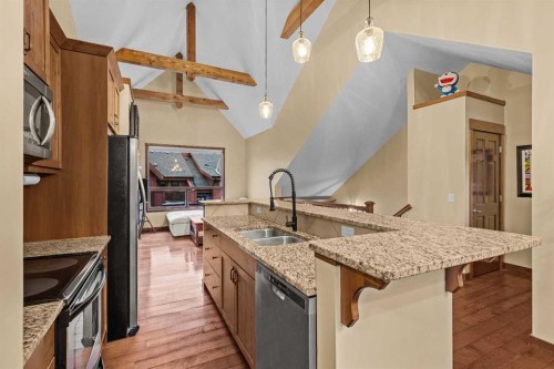 623-80 Dyrgas Gate, Canmore, AB - Indoor Photo Showing Kitchen With Double Sink