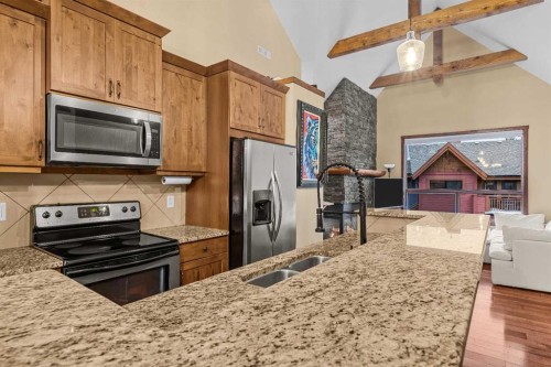 623-80 Dyrgas Gate, Canmore, AB - Indoor Photo Showing Kitchen With Double Sink