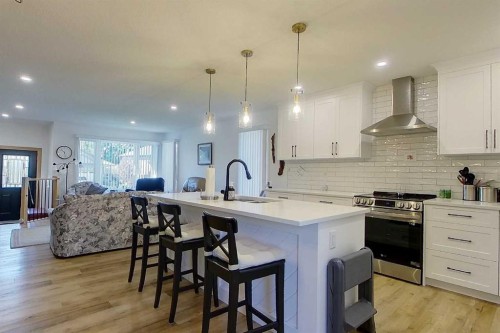 908 7 Avenue Se, Slave Lake, AB - Indoor Photo Showing Kitchen With Upgraded Kitchen