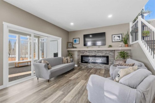 60 Pritchard Drive, Whitecourt, AB - Indoor Photo Showing Living Room With Fireplace