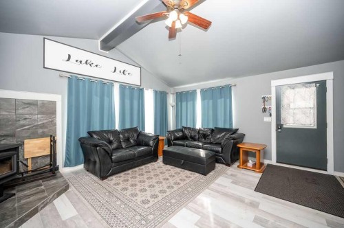 437 Sunset Road, Rural Athabasca County, AB - Indoor Photo Showing Living Room With Fireplace
