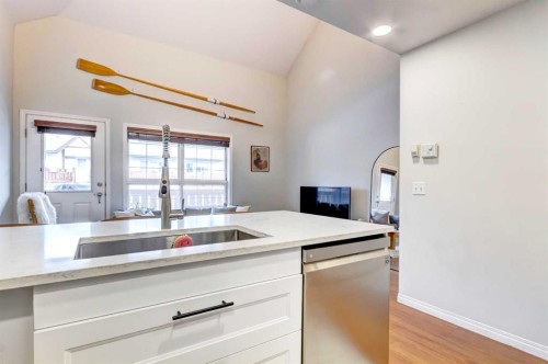 210-112 Kananaskis Way, Canmore, AB - Indoor Photo Showing Kitchen With Double Sink