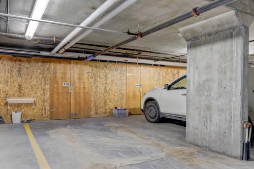 210-112 Kananaskis Way, Canmore, AB - Indoor Photo Showing Garage