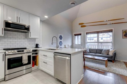 210-112 Kananaskis Way, Canmore, AB - Indoor Photo Showing Kitchen With Stainless Steel Kitchen With Upgraded Kitchen