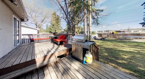 4237 5 Ave, Edson, AB - Indoor Photo Showing Living Room With Fireplace