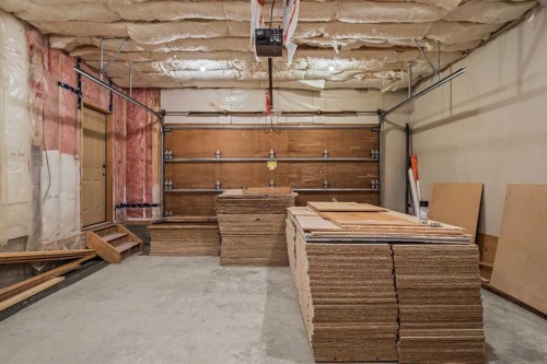 11 Aspen Glen, Canmore, AB - Indoor Photo Showing Garage