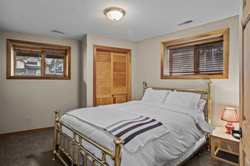 181 Carey, Canmore, AB - Indoor Photo Showing Bedroom