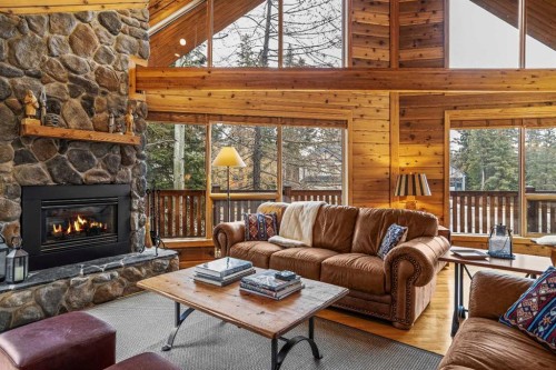 181 Carey, Canmore, AB - Indoor Photo Showing Living Room With Fireplace