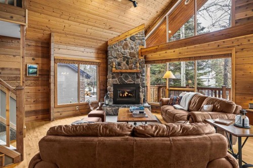 181 Carey, Canmore, AB - Indoor Photo Showing Living Room With Fireplace