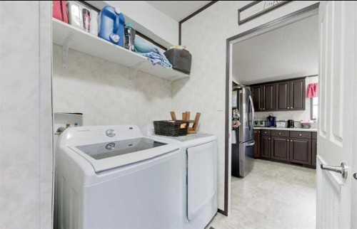 2330 Waskway Drive, Wabasca, AB - Indoor Photo Showing Laundry Room