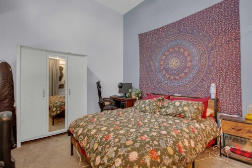 310-414 Squirrel Street, Banff, AB - Indoor Photo Showing Bedroom