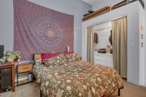 310-414 Squirrel Street, Banff, AB - Indoor Photo Showing Bedroom