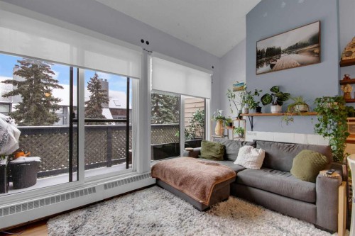 310-414 Squirrel Street, Banff, AB - Indoor Photo Showing Living Room