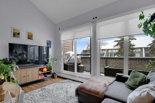 310-414 Squirrel Street, Banff, AB - Indoor Photo Showing Living Room