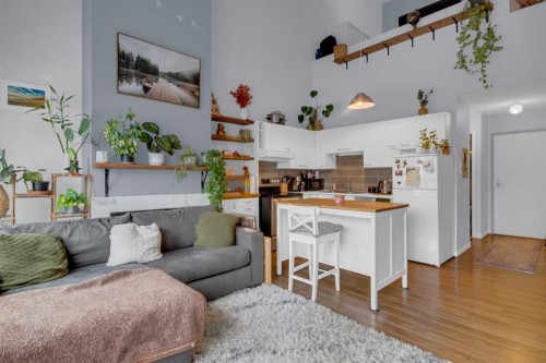 310-414 Squirrel Street, Banff, AB - Indoor Photo Showing Living Room