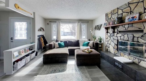 4230 5 Avenue, Edson, AB - Indoor Photo Showing Living Room With Fireplace