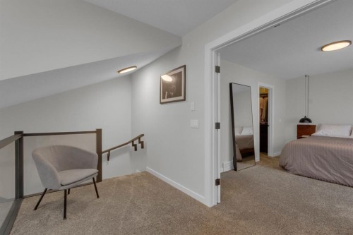 2-729 7Th, Canmore, AB - Indoor Photo Showing Bedroom