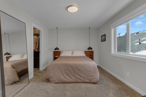 2-729 7Th, Canmore, AB - Indoor Photo Showing Bedroom