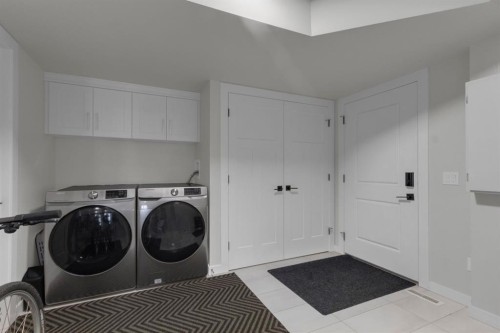 2-729 7Th, Canmore, AB - Indoor Photo Showing Laundry Room