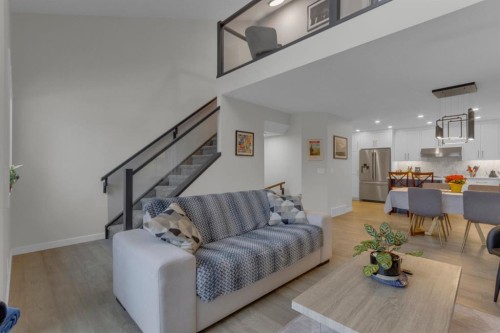 2-729 7Th, Canmore, AB - Indoor Photo Showing Living Room